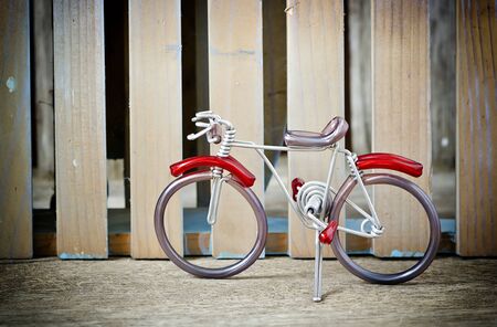 Hand craft bicycle made by aluminium wire for background.の写真素材