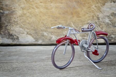 Hand craft bicycle made by aluminium wire for background.の写真素材