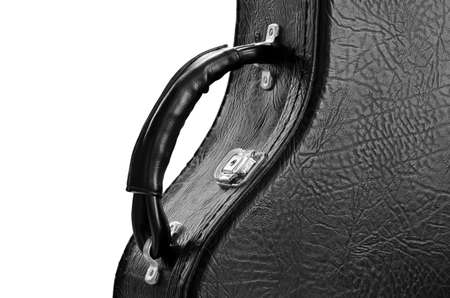 Black leather  guitar case isolated on white backgroundの写真素材