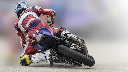 Unidentified rider in motorcycle racing with soft background.の写真素材