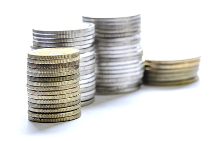 coin stack on white background,shallow DOF