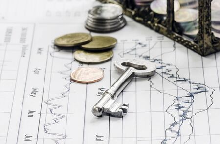 The key on stock chart background,for finance concept.の写真素材