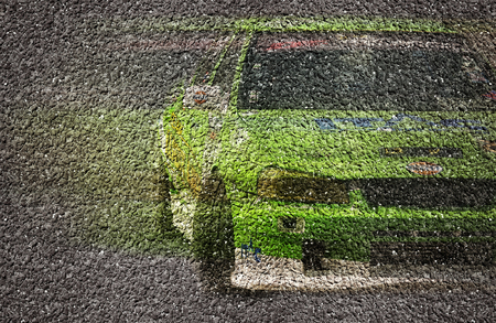 Printed color of green race car on asphalt road,for background.の写真素材