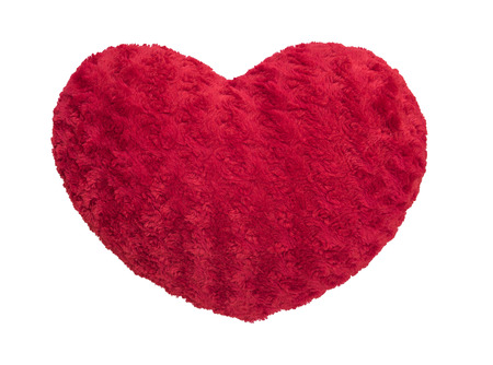 red silk pillow with heart shape isolated on white,with clipping pathの写真素材