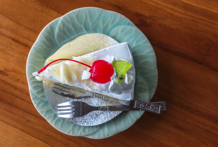 red cherry on white cake,top viewの写真素材