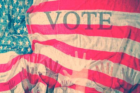 Voting concept,hands up with united states national flag background,vintage designの写真素材