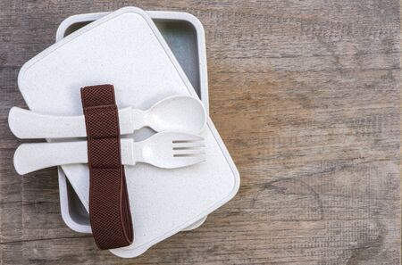 Set of non toxin food container on wooden table,top viewの写真素材