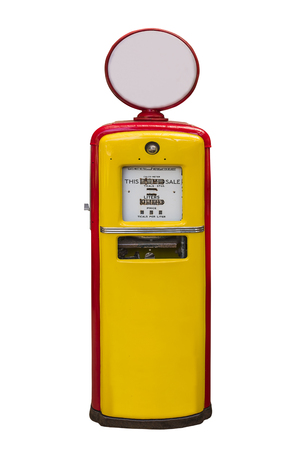 yellow vintage gasoline pump over white background,with clipping pathの写真素材