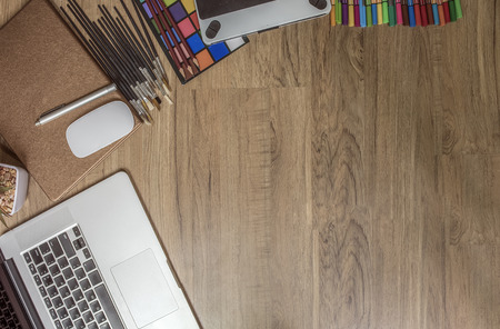 Top view of contemporary creative studio workplace with copy space.の写真素材