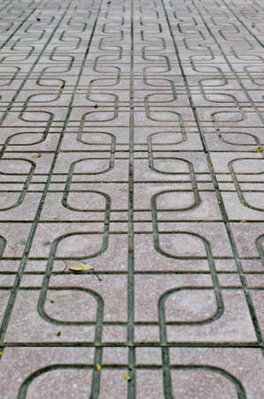 A photo of Background Tile Floor. This tile used for outdoor.