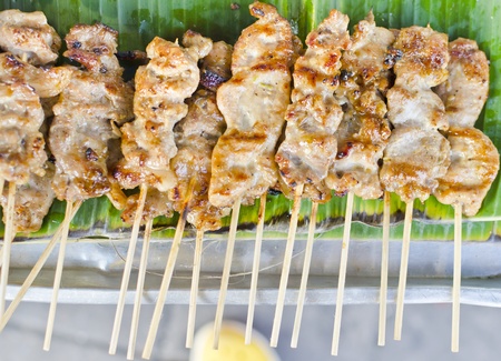 grilled pork on the banana leaf.の写真素材