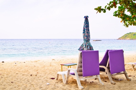 deck chairs on the beachの写真素材