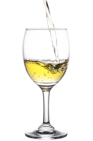 pouring white wine isolated on whiteの写真素材