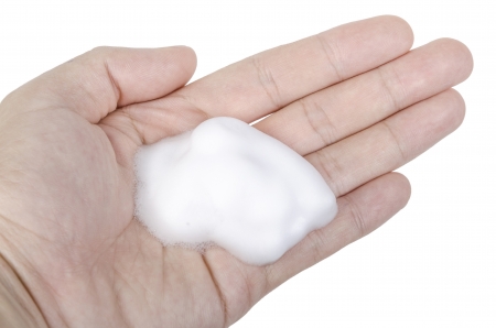 Soapy foam on handの写真素材