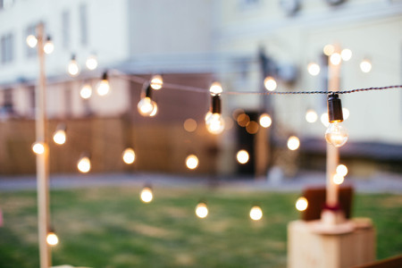Wedding and party place decoration with lamps and garlands