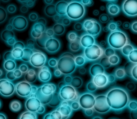 Abstract blue bubbles floating on black background.の写真素材