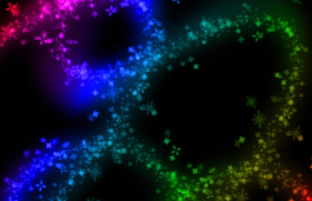 Abstract neon rainbow stars and swirls on black background の写真素材