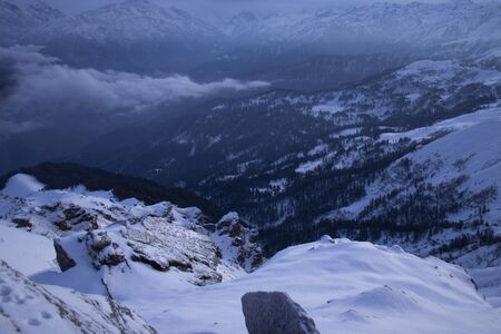 A beautiful view of snow capped mountains before sunrise from the top of the mountain in himalayaの写真素材