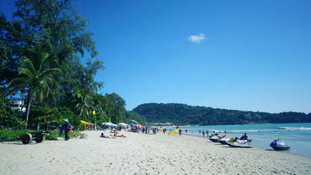 Phuket, Thailand - June 22, 2018 - Peoples relaxing at a beach.のeditorial素材