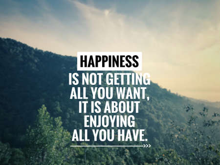 Motivational and inspirational quote - Happiness is not getting all you want, it is about enjoying all you have. Blurred styled background.の写真素材