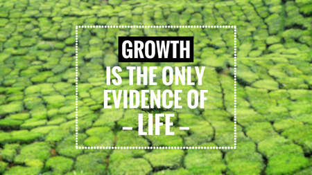 Motivational and inspirational quote - Growth is the only evidence of life. Blurred styled background.の写真素材