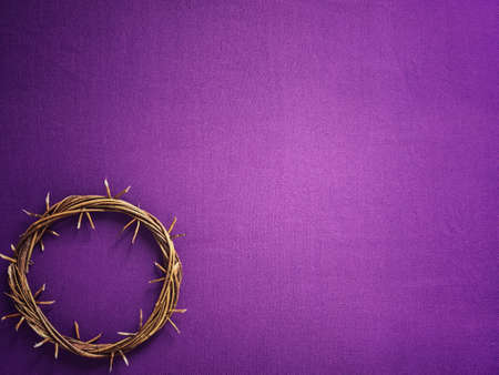 Good Friday, Lent Season and Holy Week concept - A woven crown of thorns on purple background.の写真素材