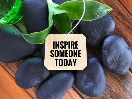 Inspirational wording - Inspire Someone Today written on a paper.の写真素材