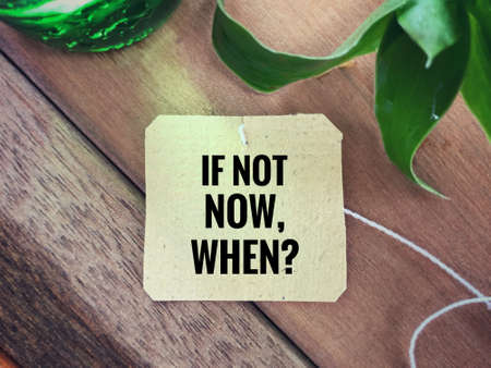 Inspirational wording - If Not Now, When written on a paper.の写真素材