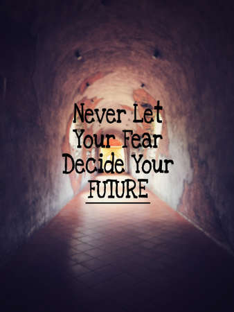 Motivational and inspirational quote - Never let your fear decide your future. Blurred styled...
