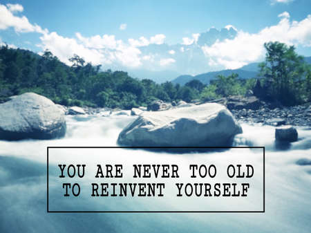 Motivational and inspirational wording - You Are Never Too Old To Reinvent Yourself. Blurred styled...