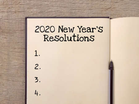 New year resolutions concept - 2020 New Yearâs Resolutions written on a book planner.の写真素材