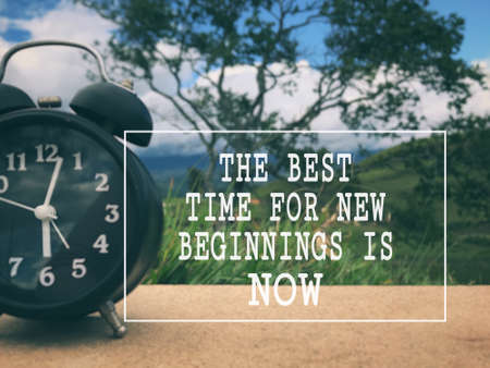 Motivational and inspirational wording - The Best Time For New Beginnings Is Now. Blurred styled...