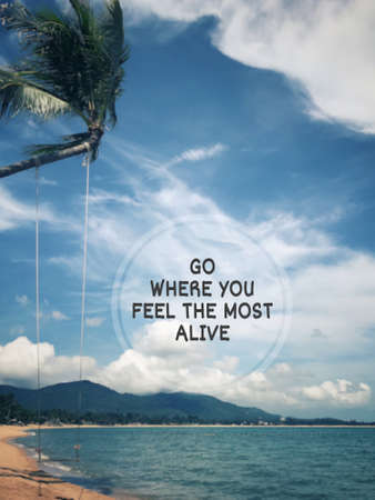 Motivational and inspirational wording - Go where you feel the most alive. Blurred styled background.の写真素材