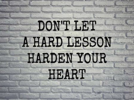 Motivational and inspirational wording - Donât Let A Hard Lesson Harden Your Heart. Blurred styled background.の写真素材
