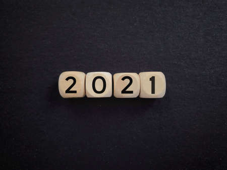 2021 written on wooden blocks. Vintage styled