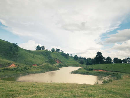 Nature and landscape concept. View of a lake by the hillside located in Ranau, Sabah.の写真素材