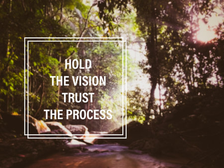 Motivational and inspirational wording. Hold your vision. Trust the process. With blurred vintage styled background.の写真素材