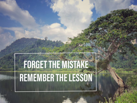 Motivational and inspirational wording.Forget The Mistake Remember The Lesson. Written on blurred styled background.の写真素材