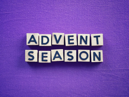 Christianity concept about Advent and Christmas season. ADVENT SEASON written on wooden blocks. With blurred style background.の写真素材