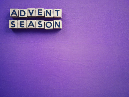 Christianity concept about Advent and Christmas season. ADVENT SEASON written on wooden blocks. With blurred style background.の写真素材