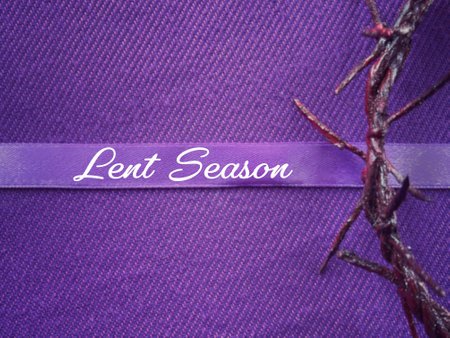 Christianity concept about Ash Wednesday, Good Friday, Lent Season and Holy Week. Lent Season written on a purple ribbon. With blurred style background.の写真素材
