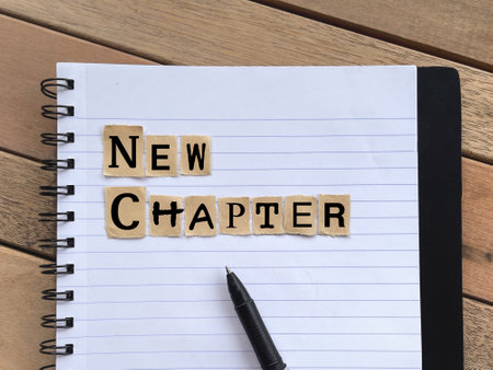Motivational and inspirational wording. NEW CHAPTER written on ripped paper.の写真素材