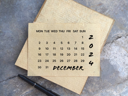 Month, time and calendar concept. Calendar for month of DECEMBER 2024. On blurred styled background.の写真素材