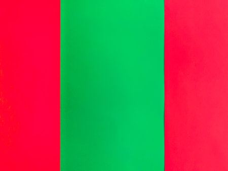 Background and copy space concept for Christmas season. Empty or copy space for Christmas season purpose in red and green paper background.の写真素材