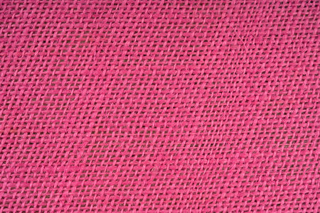 Close up of dark pink burlap textureの写真素材
