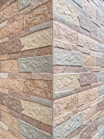 Natural stone wall texture pattern photographed in Canggu, Bali, Indonesia, ideal for background and...