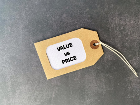 Business concept showing value versus price on label tag representing marketing strategy and consumer decision.の写真素材