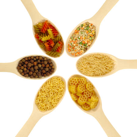 Isolated image of spoons with noodles, spices and dry mixturesの写真素材