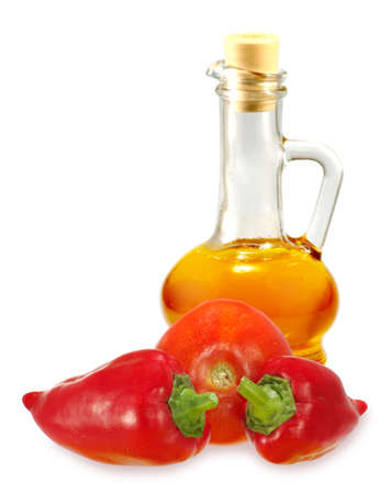 Isolated image of two red peppers and oilの写真素材