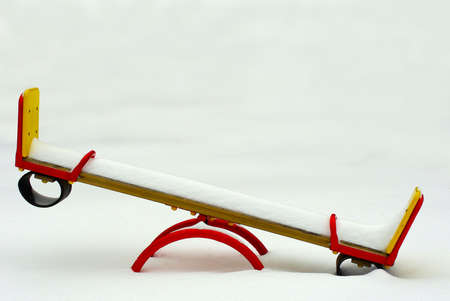 Image baby swing against a snowy backgroundの写真素材